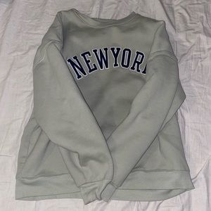 Brandy Melville sage green New York sweatshirt